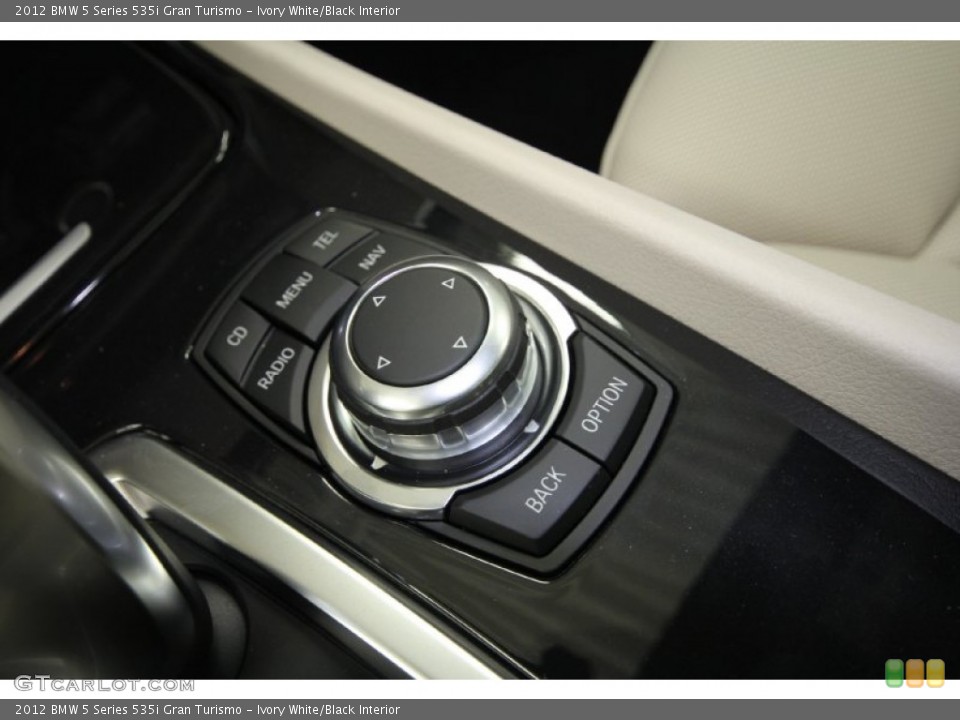 Ivory White/Black Interior Controls for the 2012 BMW 5 Series 535i Gran Turismo #59542029