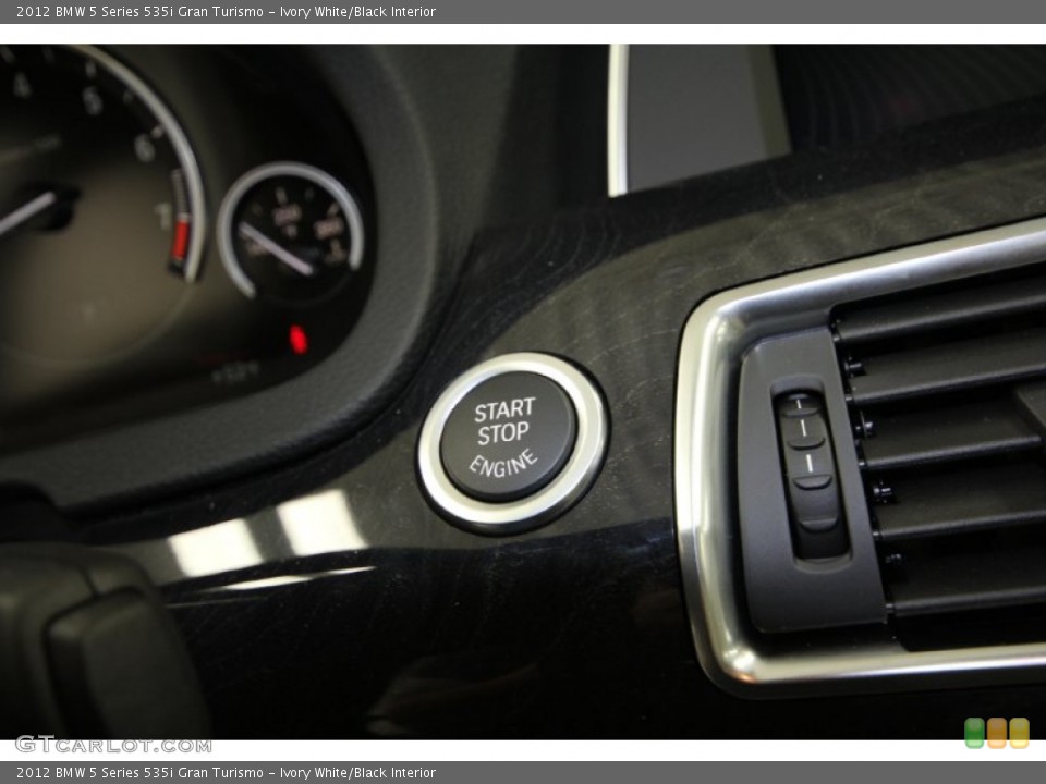 Ivory White/Black Interior Controls for the 2012 BMW 5 Series 535i Gran Turismo #59542047