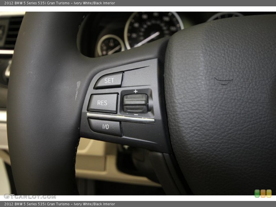 Ivory White/Black Interior Controls for the 2012 BMW 5 Series 535i Gran Turismo #59542062
