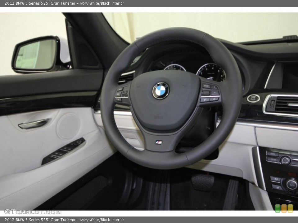 Ivory White/Black Interior Steering Wheel for the 2012 BMW 5 Series 535i Gran Turismo #59542092