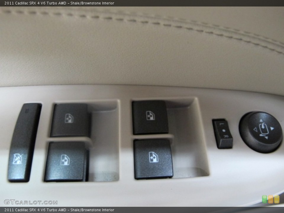 Shale/Brownstone Interior Controls for the 2011 Cadillac SRX 4 V6 Turbo AWD #59542716