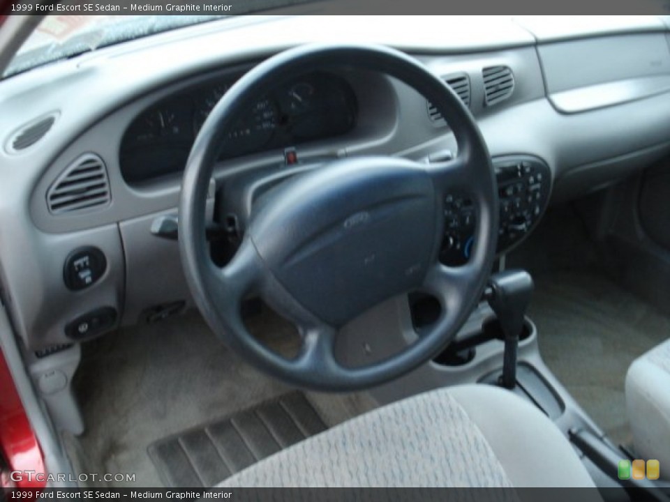 Medium Graphite Interior Dashboard for the 1999 Ford Escort SE Sedan #59576115