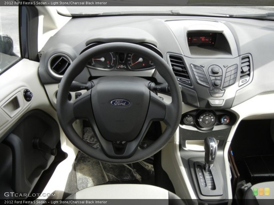 Light Stone/Charcoal Black Interior Dashboard for the 2012 Ford Fiesta S Sedan #59584275