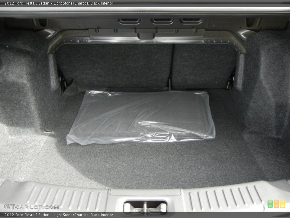 Light Stone/Charcoal Black Interior Trunk for the 2012 Ford Fiesta S Sedan #59584302