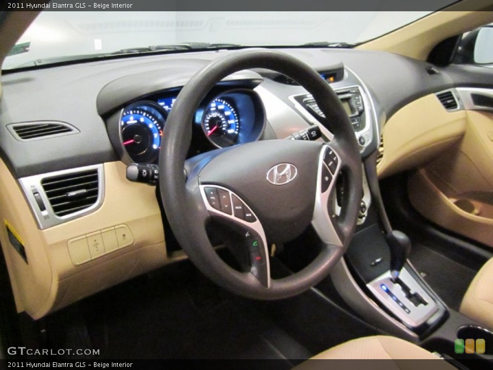 Beige Interior Dashboard for the 2011 Hyundai Elantra GLS #59613639