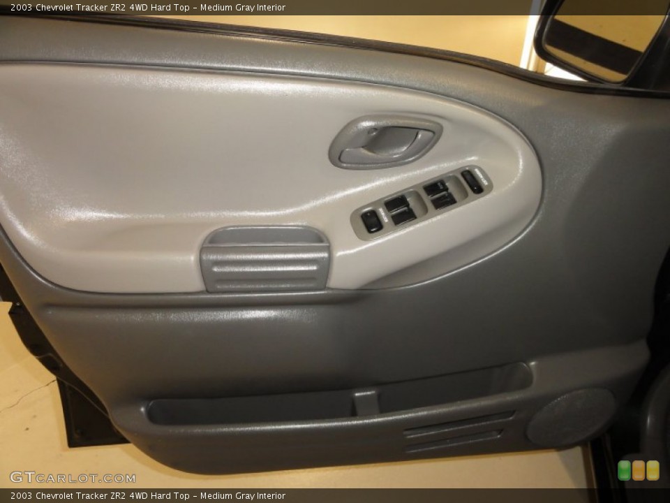 Medium Gray Interior Door Panel for the 2003 Chevrolet Tracker ZR2 4WD Hard Top #59615397