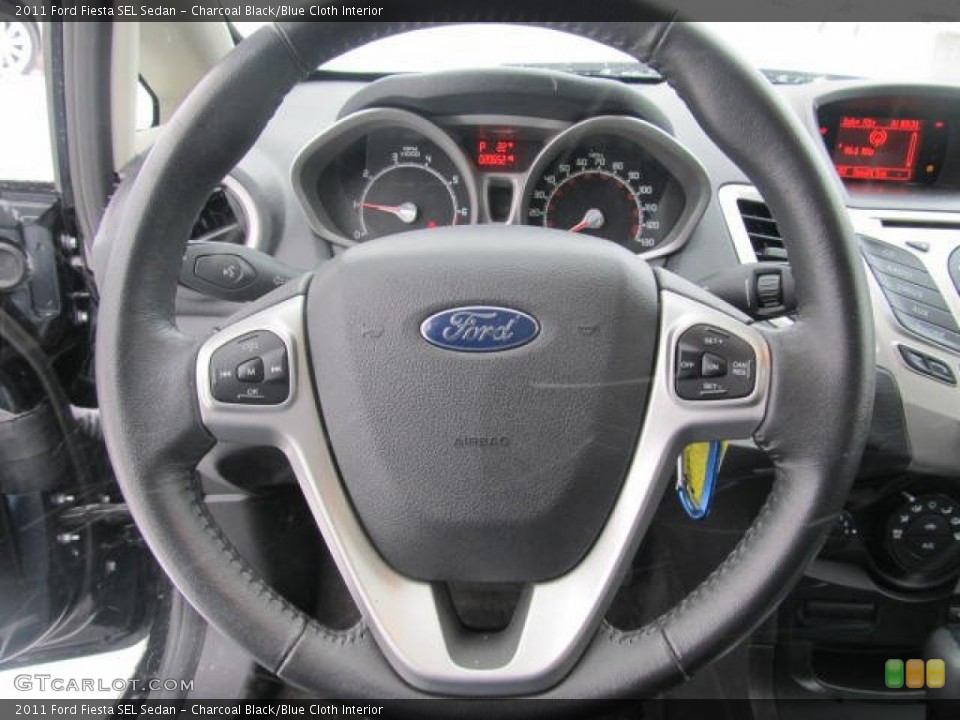 Charcoal Black/Blue Cloth Interior Steering Wheel for the 2011 Ford Fiesta SEL Sedan #59619018