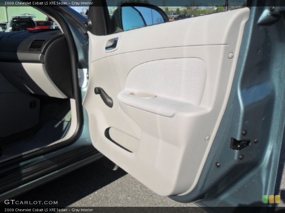 Gray Interior Door Panel for the 2009 Chevrolet Cobalt LS XFE Sedan #59628582