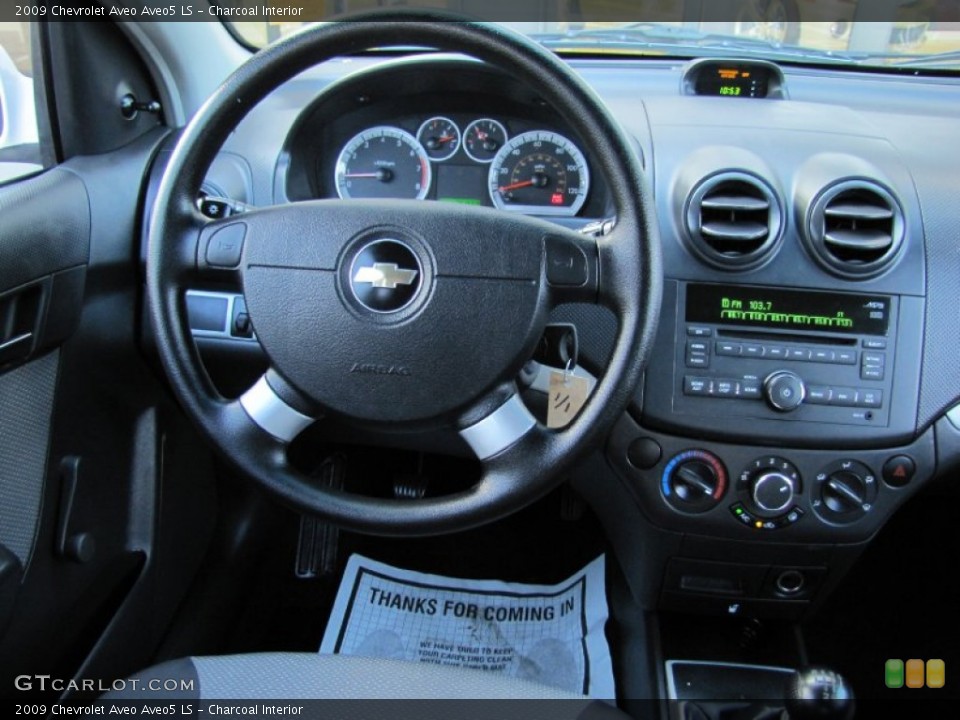Charcoal Interior Dashboard for the 2009 Chevrolet Aveo Aveo5 LS #59636217