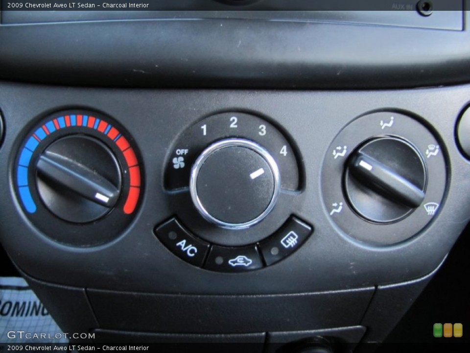 Charcoal Interior Controls for the 2009 Chevrolet Aveo LT Sedan #59636982