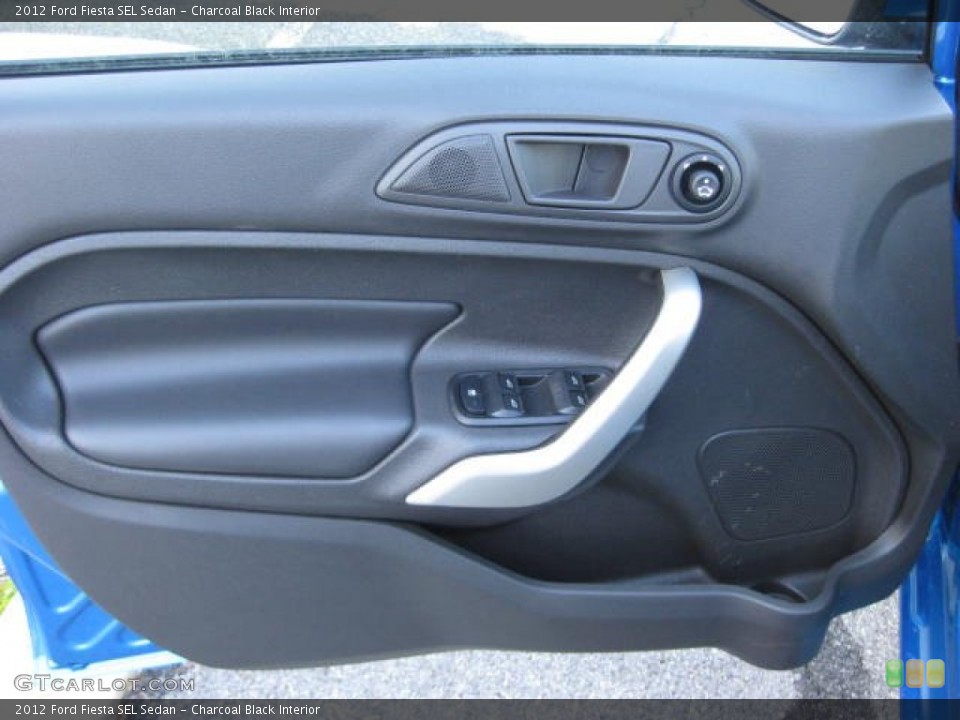 Charcoal Black Interior Door Panel for the 2012 Ford Fiesta SEL Sedan #59679506