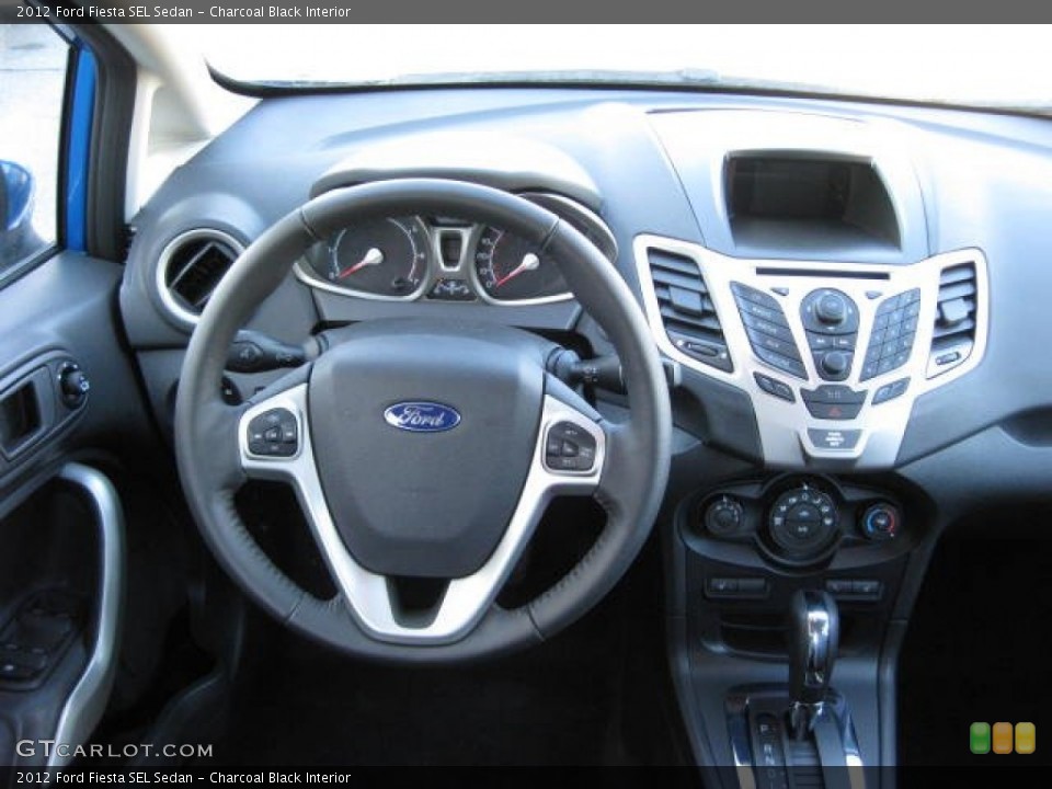 Charcoal Black Interior Dashboard for the 2012 Ford Fiesta SEL Sedan #59679550