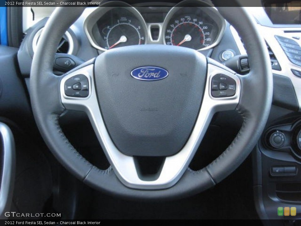 Charcoal Black Interior Steering Wheel for the 2012 Ford Fiesta SEL Sedan #59679591