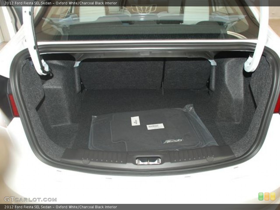 Oxford White/Charcoal Black Interior Trunk for the 2012 Ford Fiesta SEL Sedan #59685284