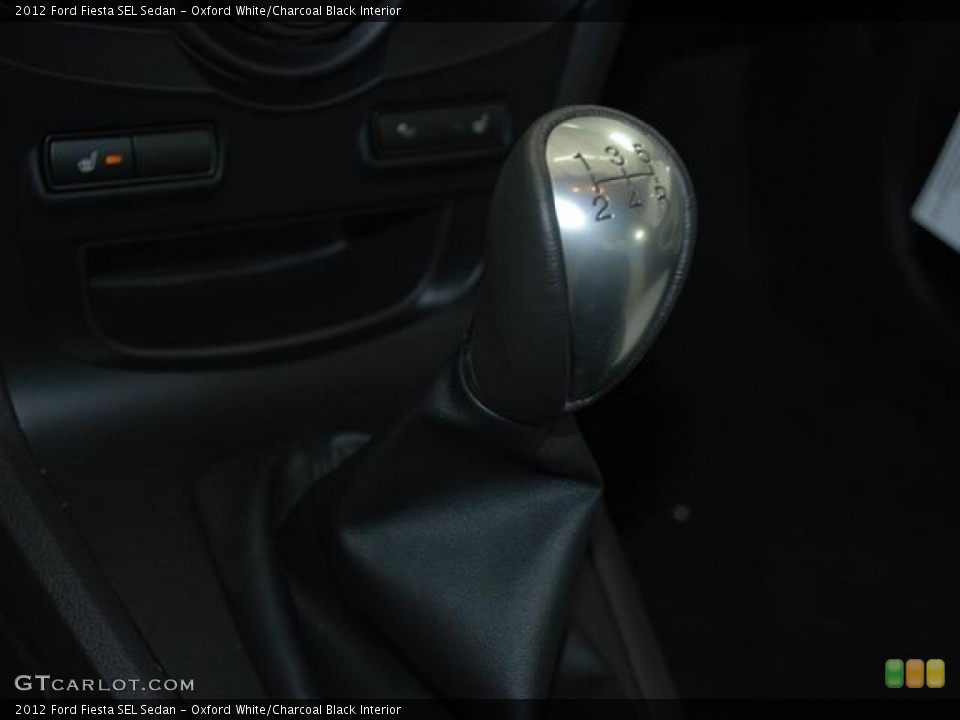 Oxford White/Charcoal Black Interior Transmission for the 2012 Ford Fiesta SEL Sedan #59685326