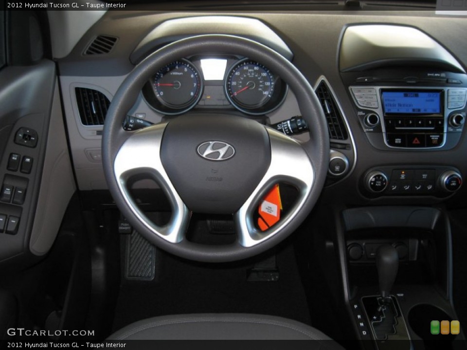 Taupe Interior Dashboard for the 2012 Hyundai Tucson GL #59701974