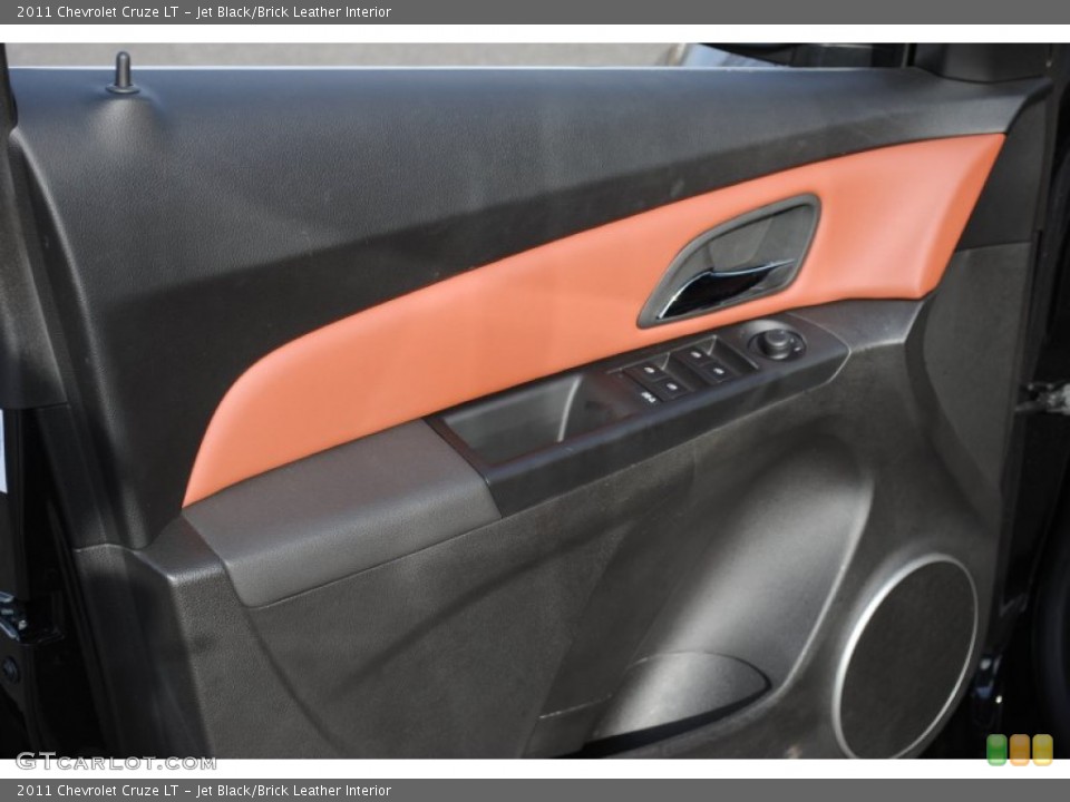 Jet Black/Brick Leather Interior Door Panel for the 2011 Chevrolet Cruze LT #59704800
