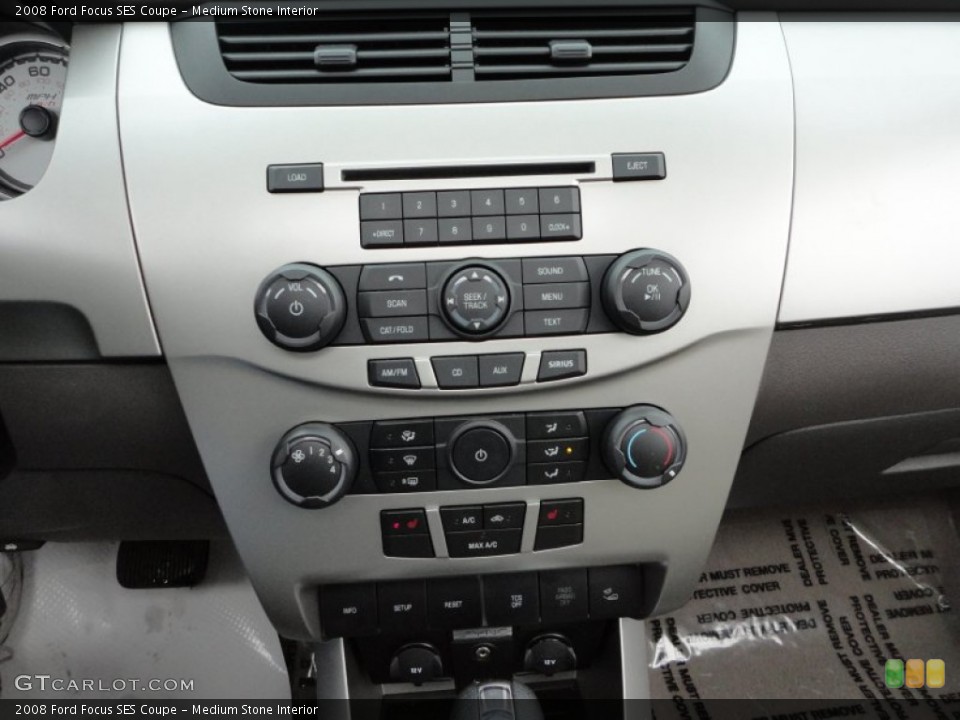Medium Stone Interior Controls for the 2008 Ford Focus SES Coupe #59721954