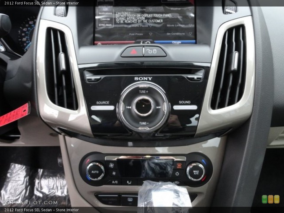 Stone Interior Controls for the 2012 Ford Focus SEL Sedan #59759777