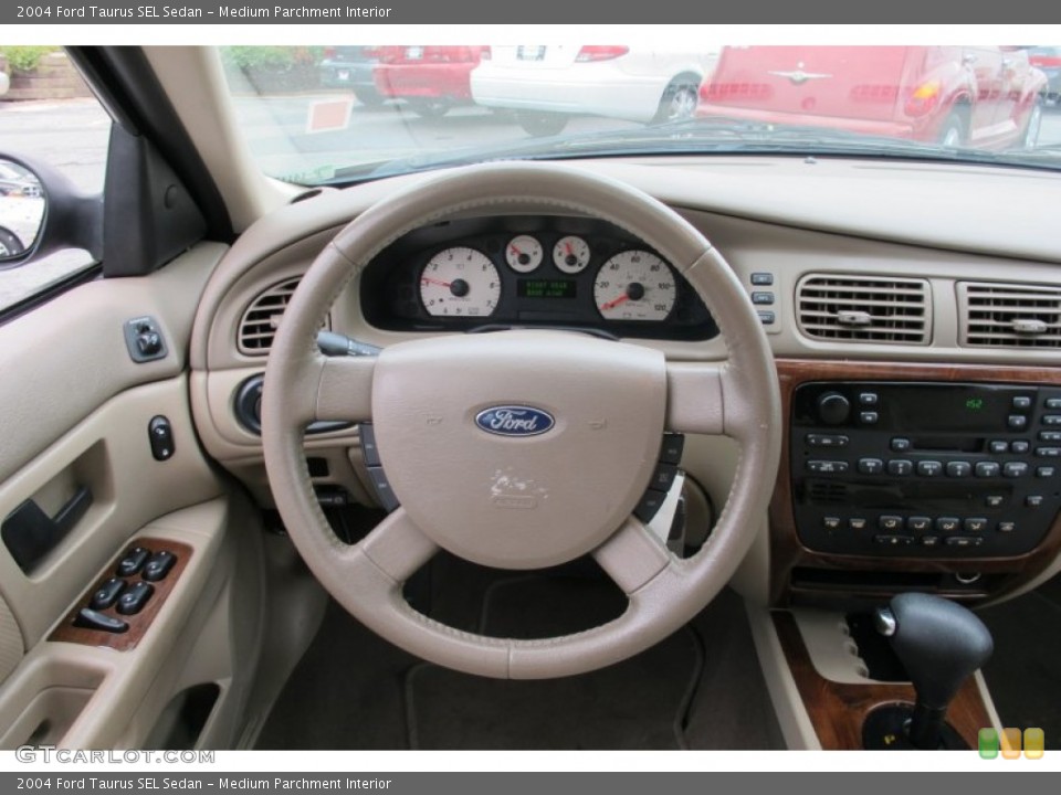 Medium Parchment Interior Steering Wheel for the 2004 Ford Taurus SEL Sedan #59760116