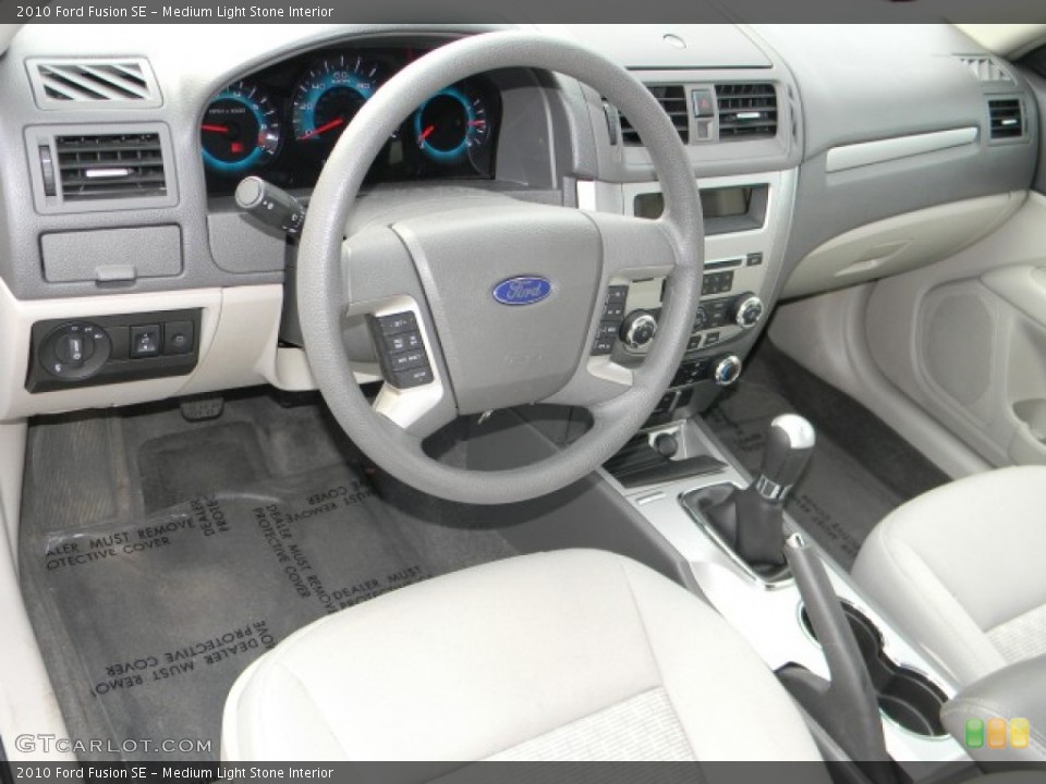 Medium Light Stone Interior Dashboard for the 2010 Ford Fusion SE #59767199