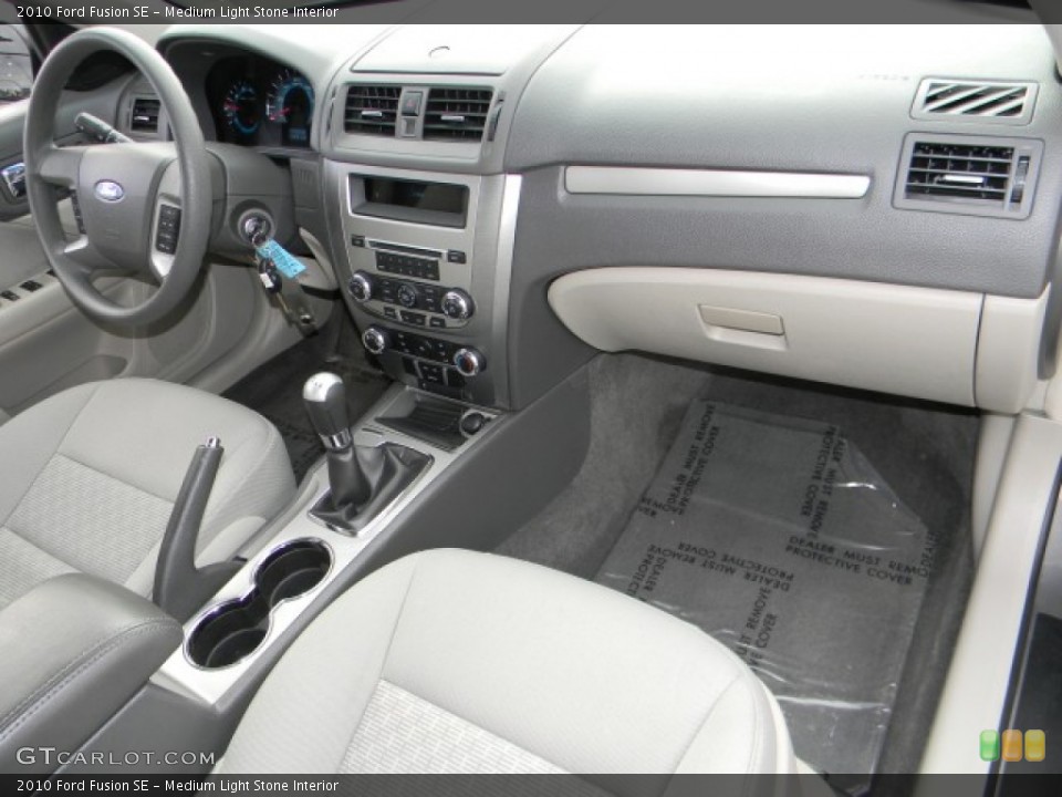 Medium Light Stone Interior Dashboard for the 2010 Ford Fusion SE #59767246
