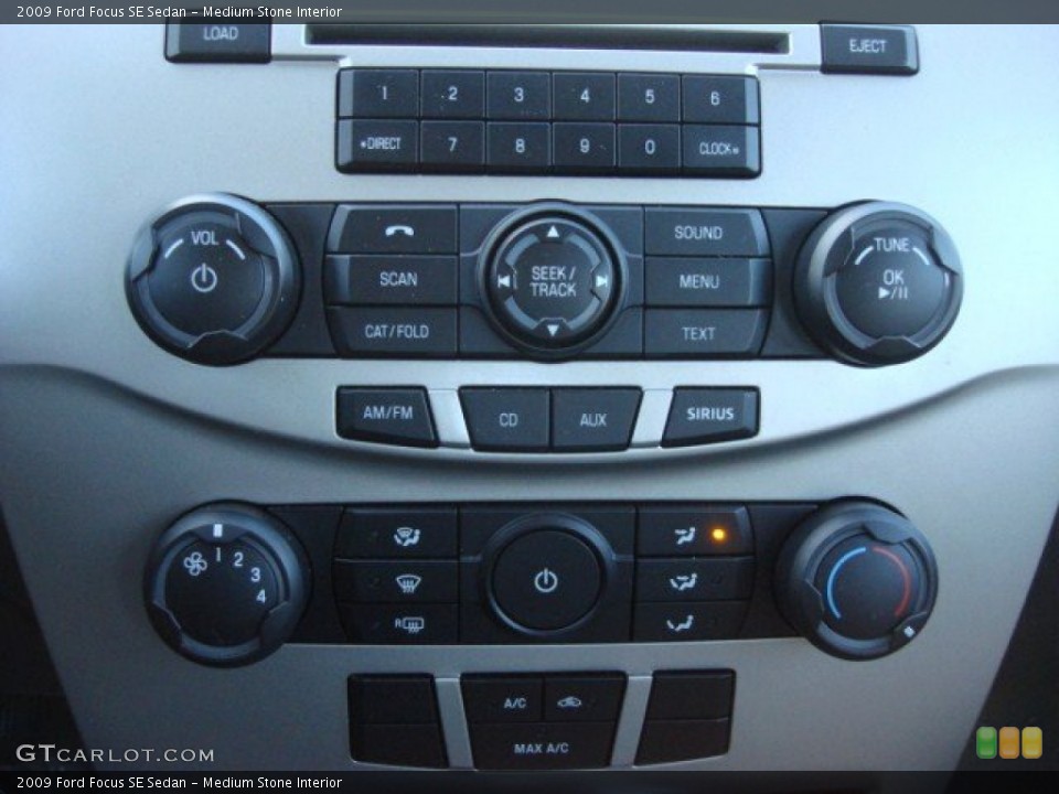 Medium Stone Interior Controls for the 2009 Ford Focus SE Sedan #59769353