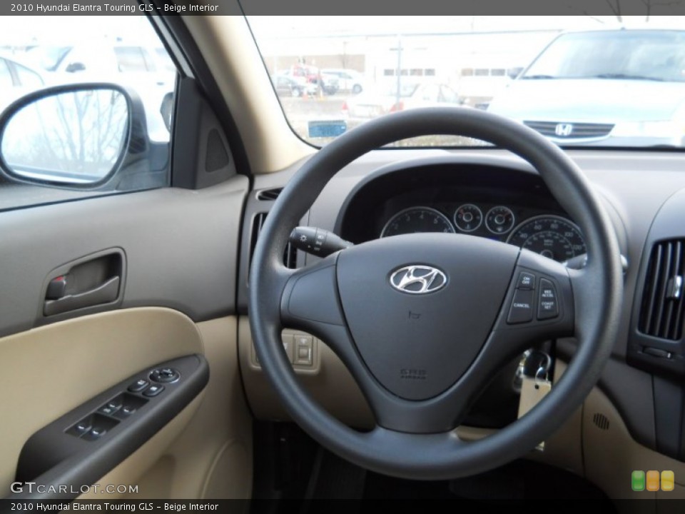 Beige Interior Steering Wheel for the 2010 Hyundai Elantra Touring GLS #59772200