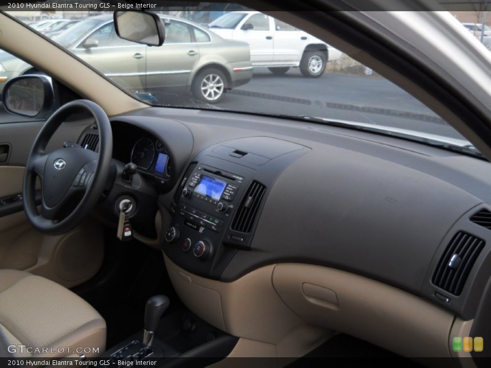 Beige Interior Dashboard for the 2010 Hyundai Elantra Touring GLS #59772347