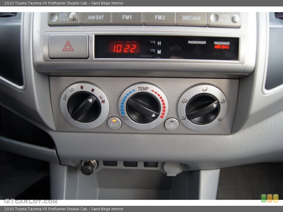 Sand Beige Interior Controls for the 2010 Toyota Tacoma V6 PreRunner Double Cab #59781134