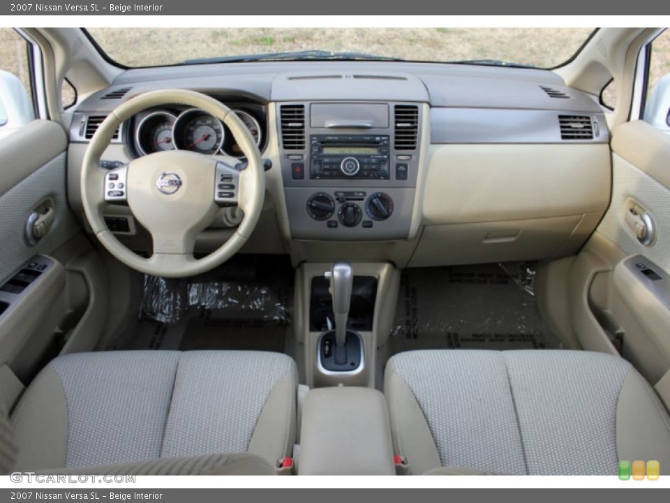 Beige Interior Dashboard for the 2007 Nissan Versa SL #59782121