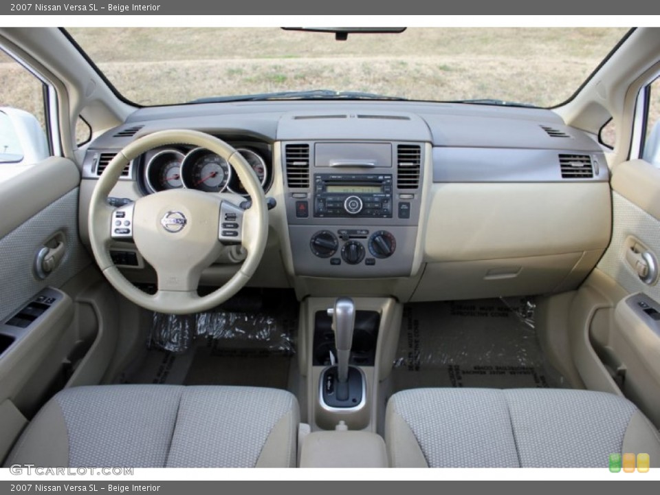 Beige Interior Dashboard for the 2007 Nissan Versa SL #59782130