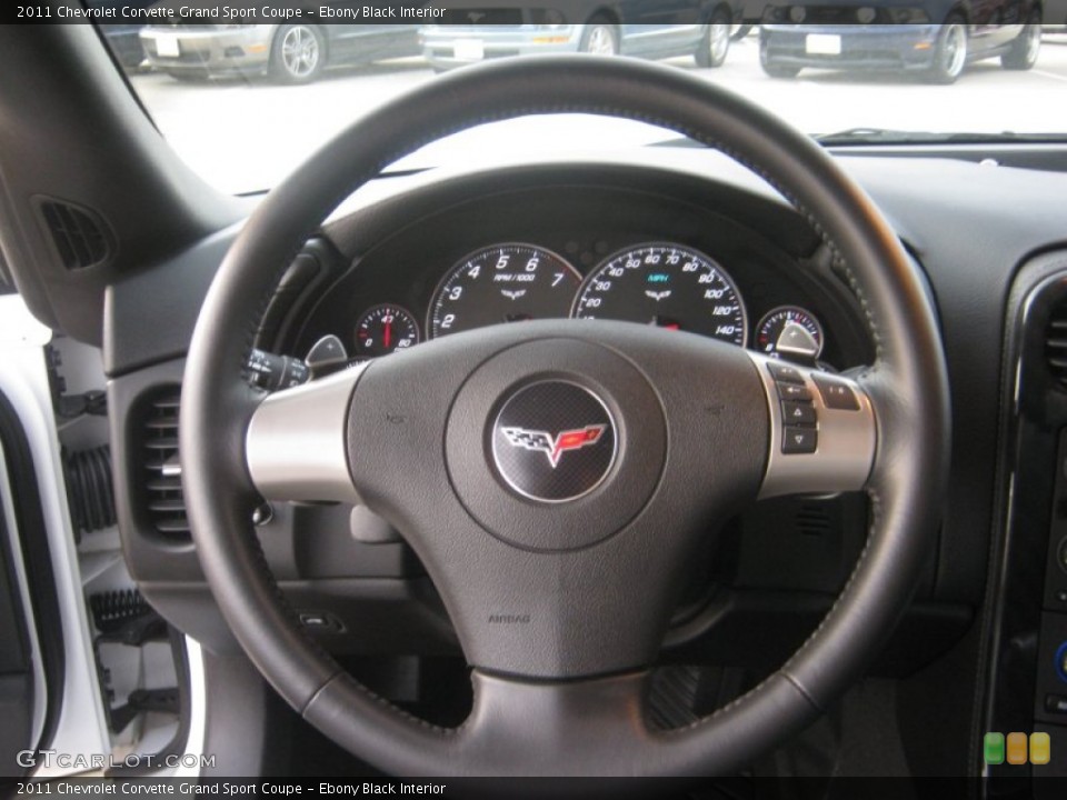 Ebony Black Interior Steering Wheel for the 2011 Chevrolet Corvette Grand Sport Coupe #59817708