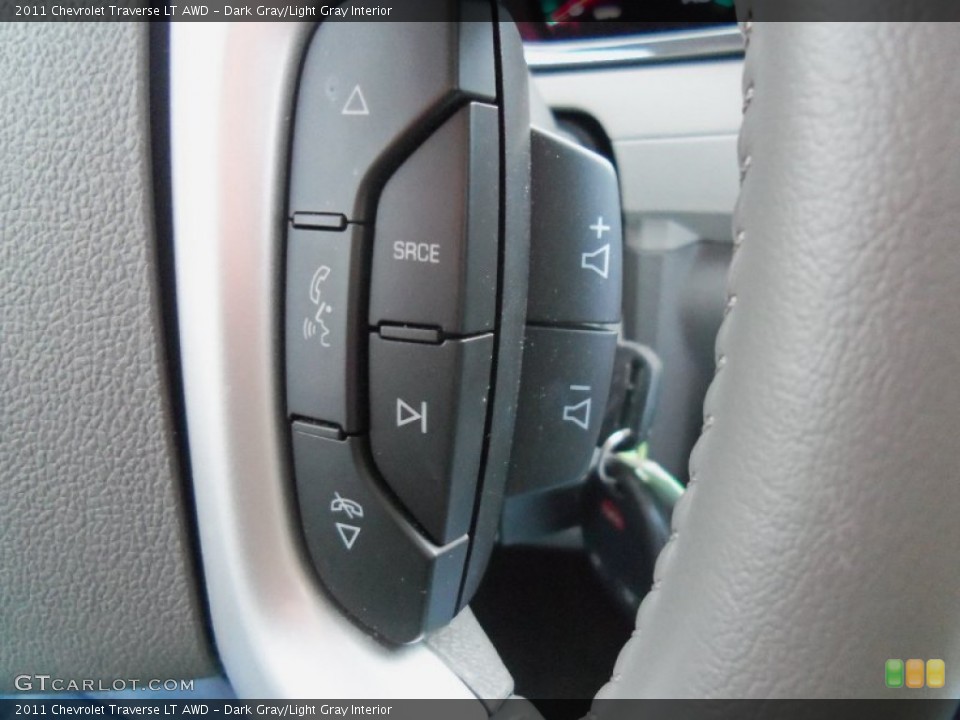 Dark Gray/Light Gray Interior Controls for the 2011 Chevrolet Traverse LT AWD #59819822