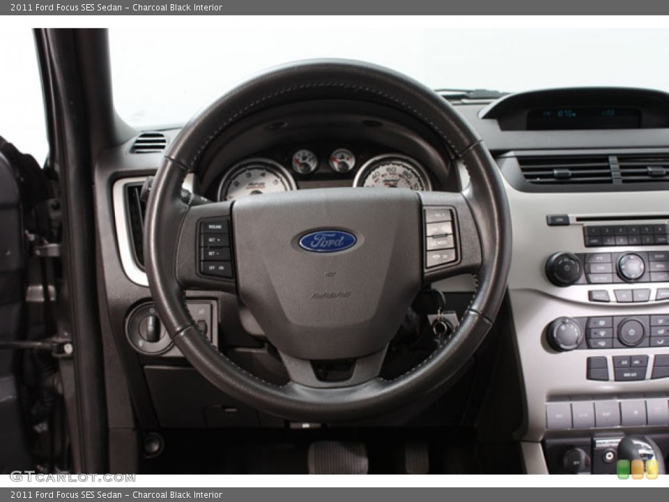 Charcoal Black Interior Steering Wheel for the 2011 Ford Focus SES Sedan #59824871