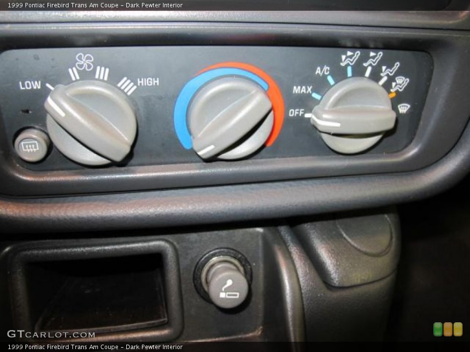 Dark Pewter Interior Controls for the 1999 Pontiac Firebird Trans Am Coupe #59828694