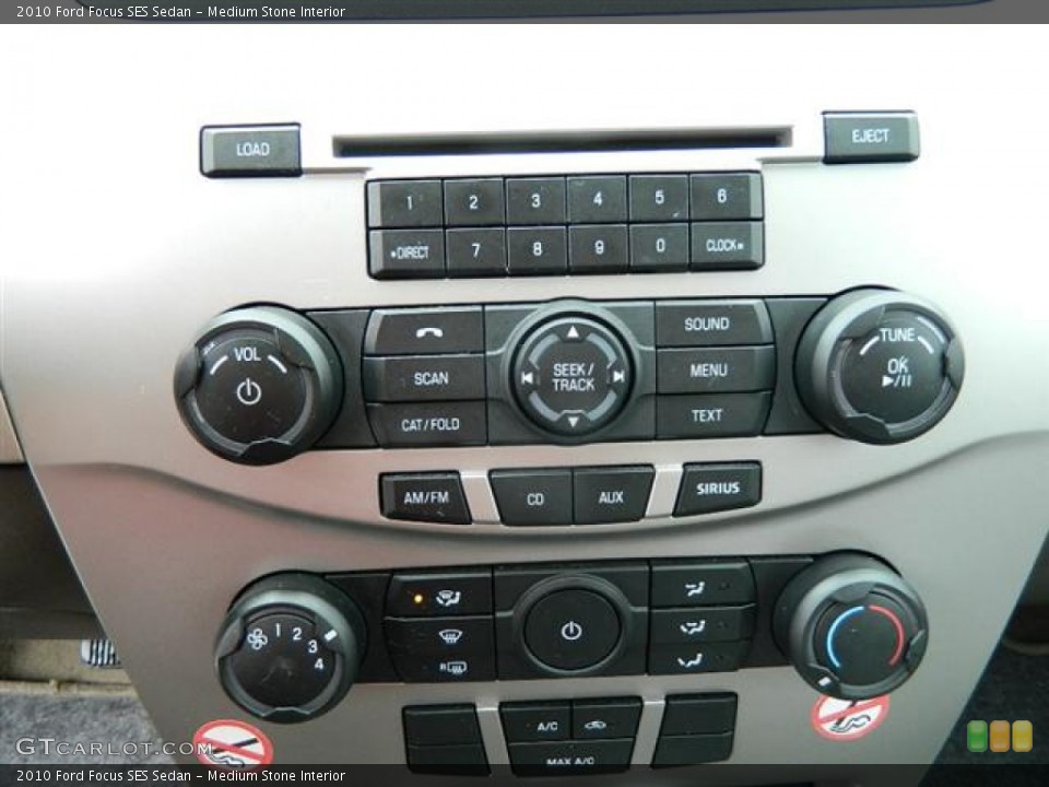 Medium Stone Interior Controls for the 2010 Ford Focus SES Sedan #59845176
