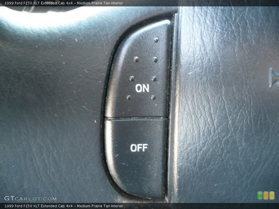 Medium Prairie Tan Interior Controls for the 1999 Ford F150 XLT Extended Cab 4x4 #59861961