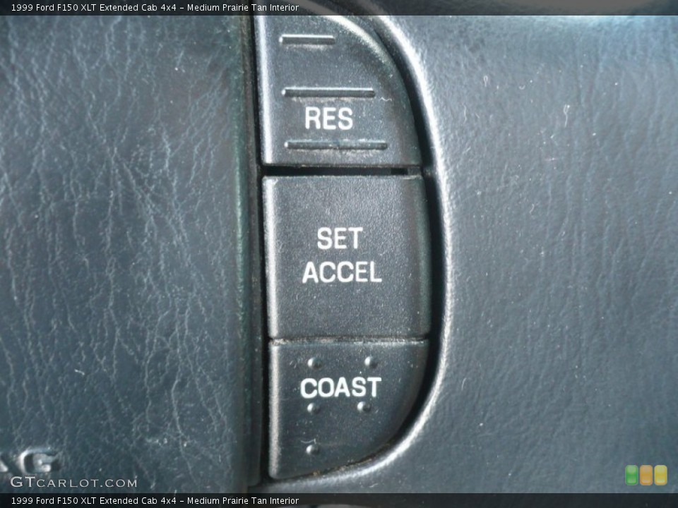 Medium Prairie Tan Interior Controls for the 1999 Ford F150 XLT Extended Cab 4x4 #59861970