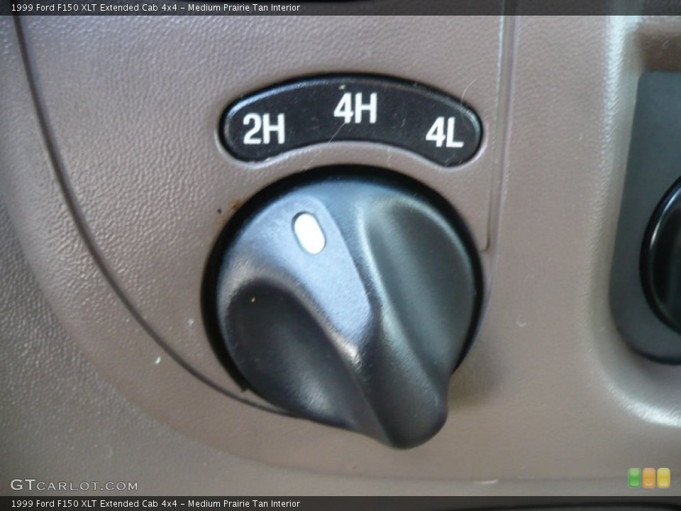 Medium Prairie Tan Interior Controls for the 1999 Ford F150 XLT Extended Cab 4x4 #59861988