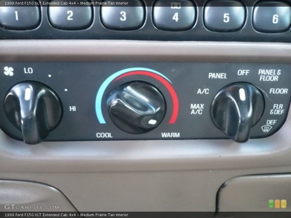 Medium Prairie Tan Interior Controls for the 1999 Ford F150 XLT Extended Cab 4x4 #59862009