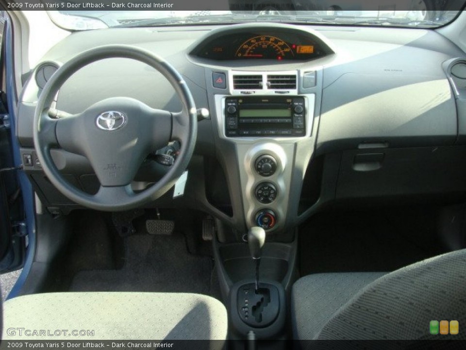 Dark Charcoal Interior Dashboard for the 2009 Toyota Yaris 5 Door Liftback #59938673