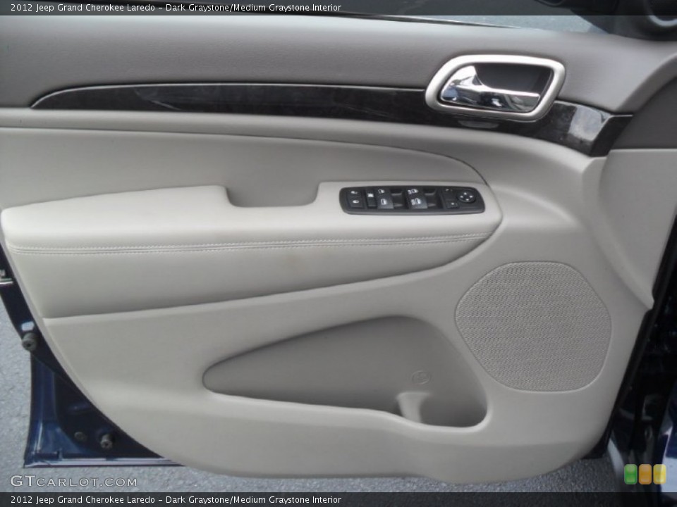 Dark Graystone/Medium Graystone Interior Door Panel for the 2012 Jeep Grand Cherokee Laredo #59954855