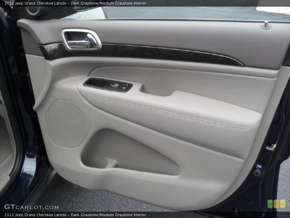 Dark Graystone/Medium Graystone Interior Door Panel for the 2012 Jeep Grand Cherokee Laredo #59954967