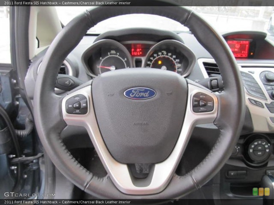 Cashmere/Charcoal Black Leather Interior Steering Wheel for the 2011 Ford Fiesta SES Hatchback #59960298