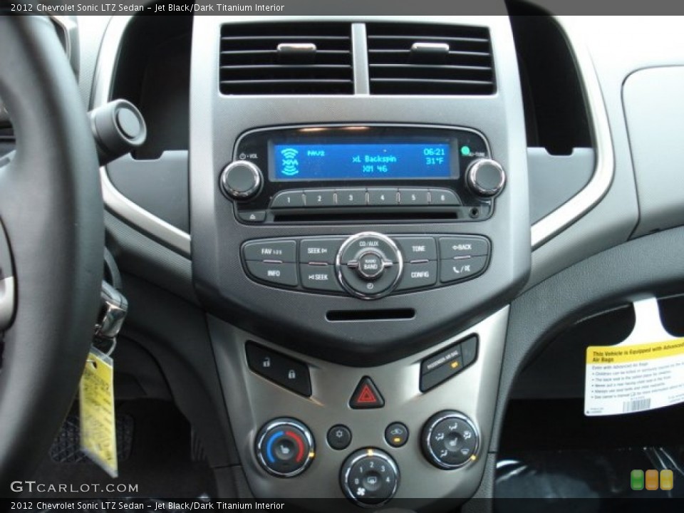 Jet Black/Dark Titanium Interior Controls for the 2012 Chevrolet Sonic LTZ Sedan #59974818