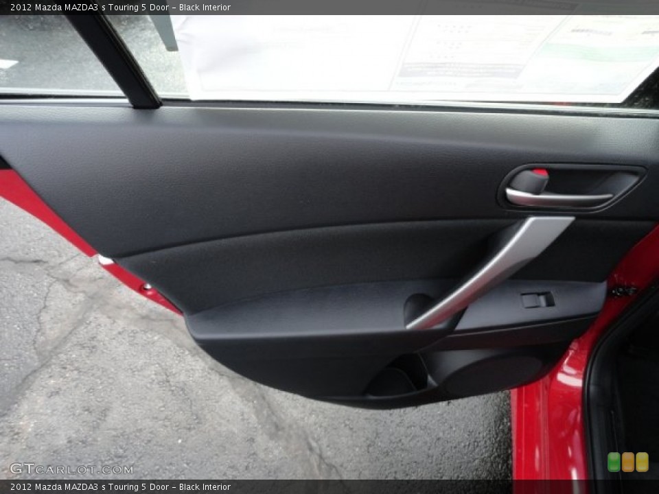 Black Interior Door Panel for the 2012 Mazda MAZDA3 s Touring 5 Door #60060774