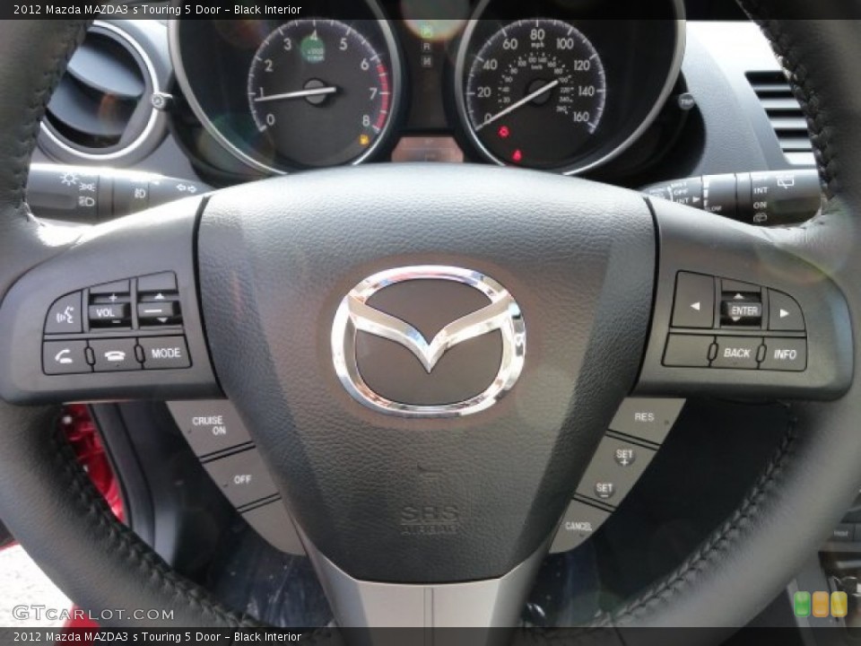 Black Interior Steering Wheel for the 2012 Mazda MAZDA3 s Touring 5 Door #60060813