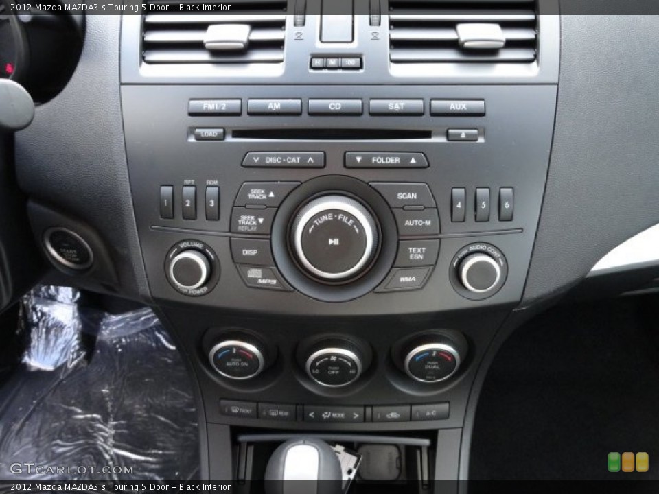 Black Interior Controls for the 2012 Mazda MAZDA3 s Touring 5 Door #60060822