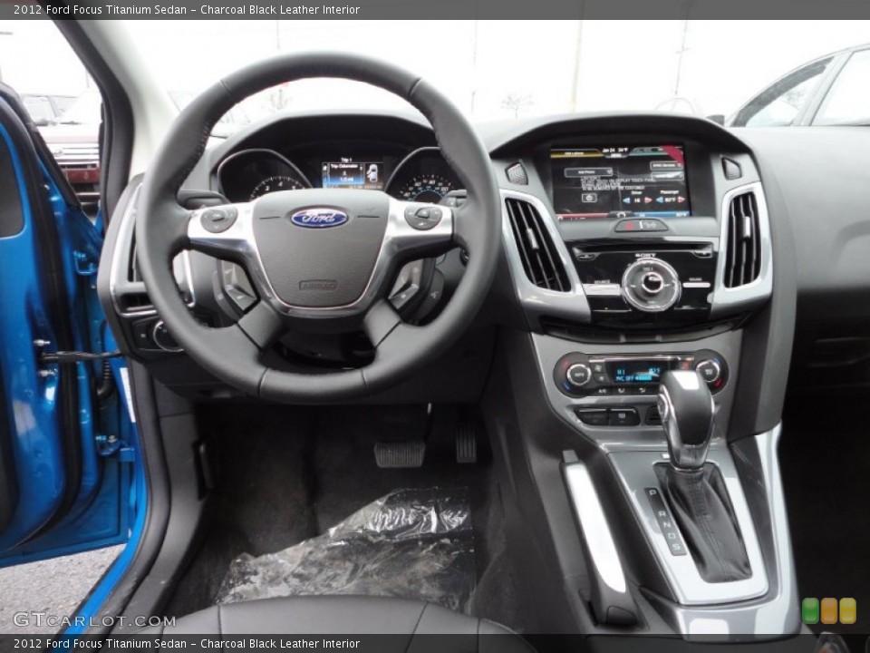 Charcoal Black Leather Interior Dashboard for the 2012 Ford Focus Titanium Sedan #60090015